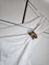 Accessorized white one shoulder top